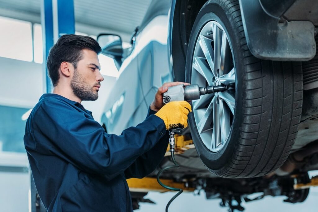 Mechanic Changing Car Tire